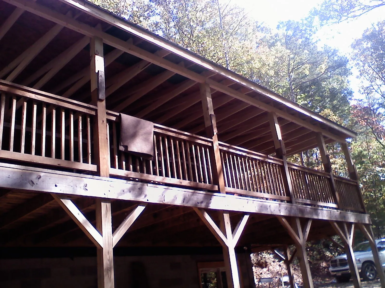Timber framing under a new elevated porch and deck — Roof Leak Repair in Olean by Roofing Brothers